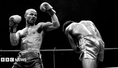 Tony Laing, left, on his way to victory over Clinton McKenzie of Croydon at the Royal Albert Hall in London