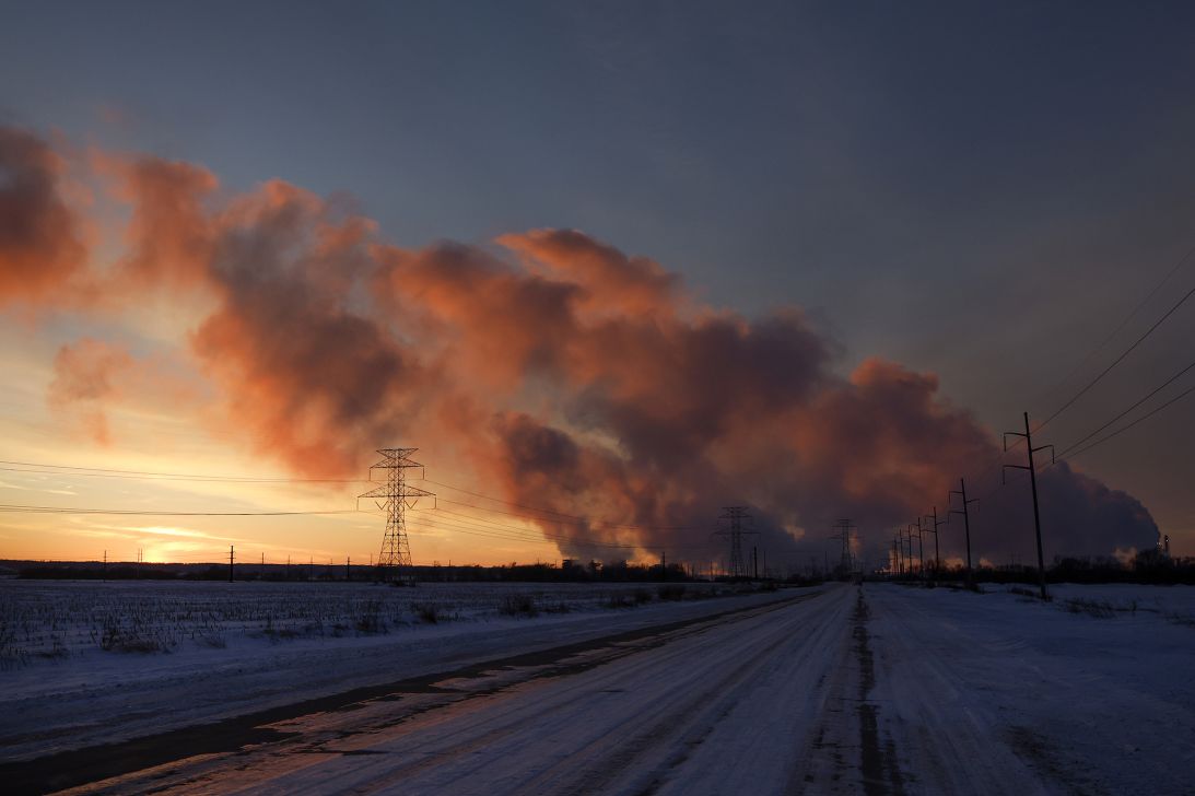 Steam from the MidAmerican Energy plant rises as the sun sets on January 14, 2024 in Sergeant Bluff, Iowa.