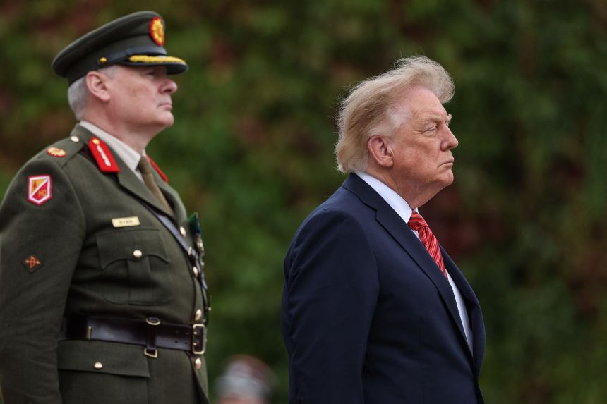 US President Donald Trump attends an arrival ceremony at Áras an Uachtaráin in Phoenix Park.