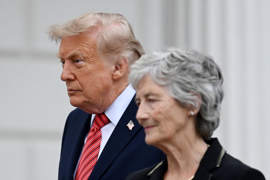 US President Donald Trump is greeted by Irish President Catherine Connolly during an arrival ceremony at Áras an Uachtaráin.