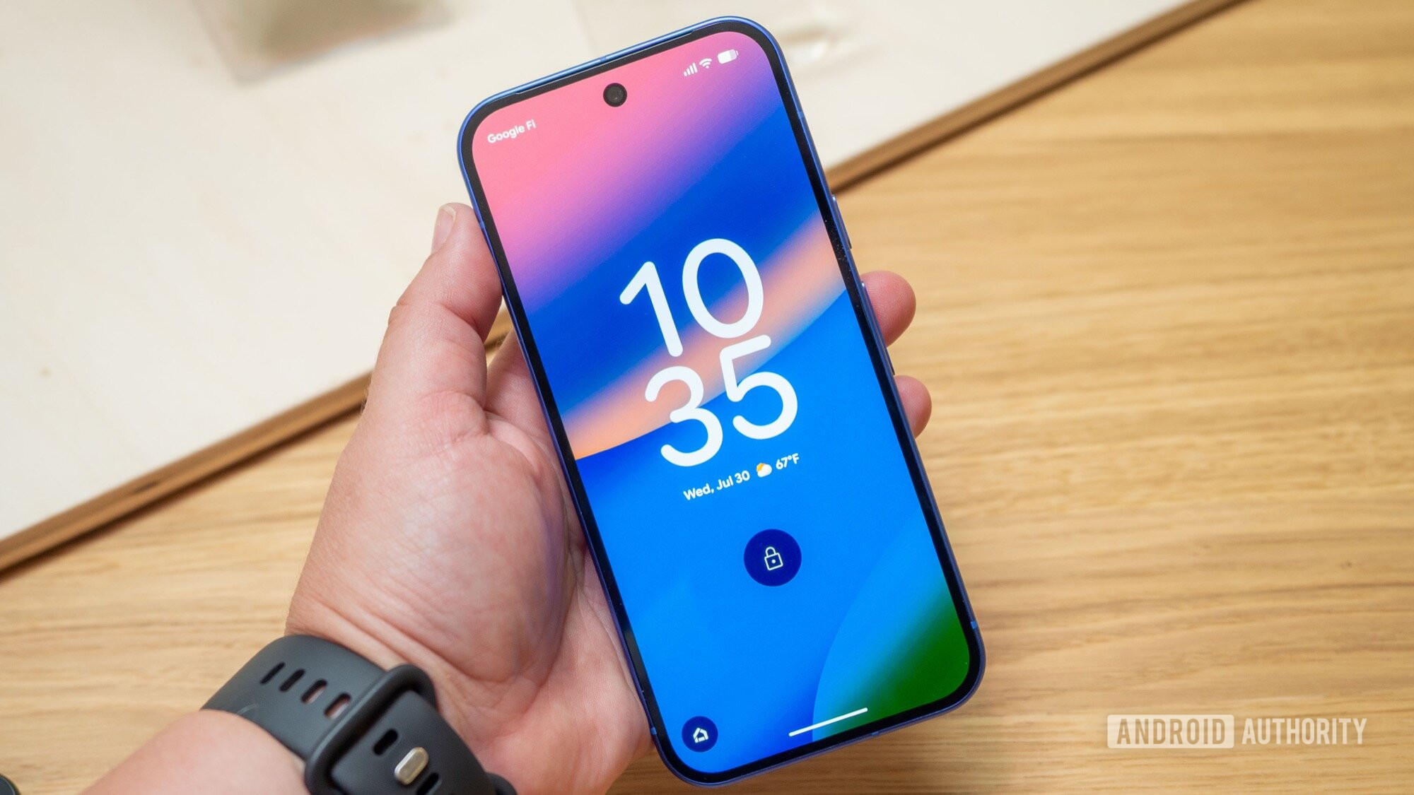 google pixel 10 in hand display lockscreen