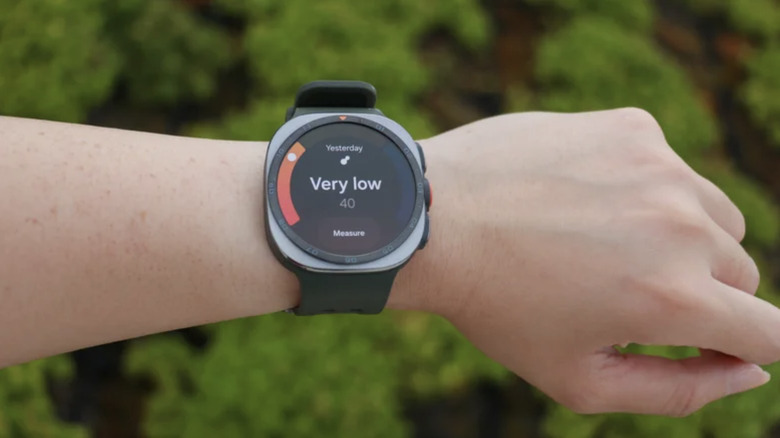 Photo of a Samsung Galaxy Watch Ultra 2 displaying the "Very low" antioxidant reading on the wearer's wrist.