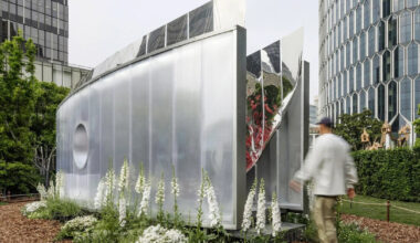 curved mirrored walls multiply one tree into infinite grove pavilion