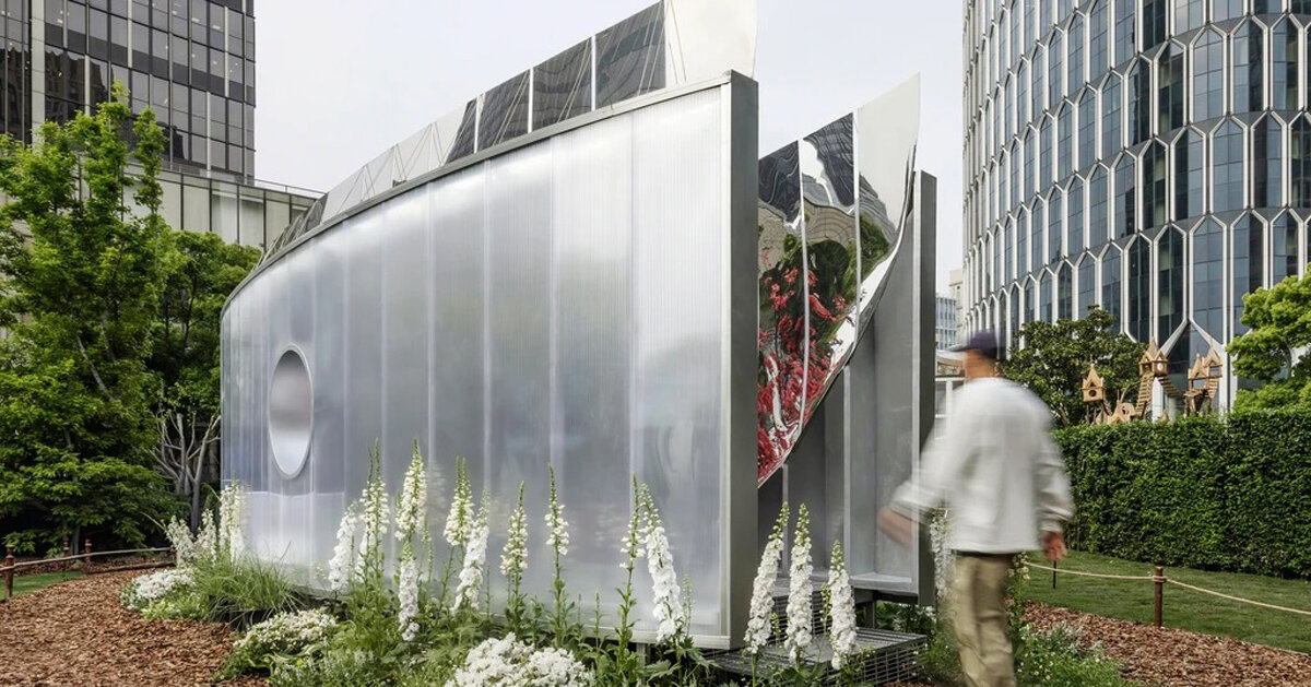 curved mirrored walls multiply one tree into infinite grove pavilion