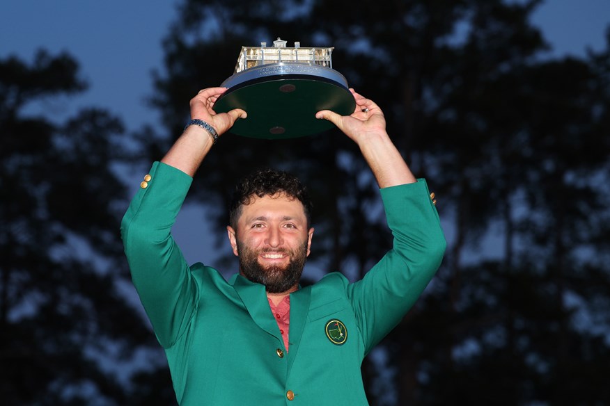 Jon Rahm lifts the Masters trophy after his victory at Augusta.