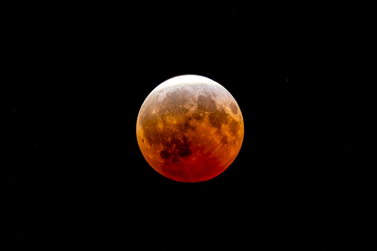 another image of last night's lunar eclipse; the moon 96.2% covered by the earth's shadow.