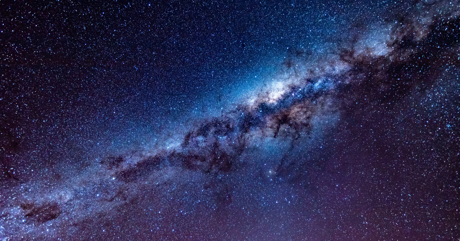 Every galaxy in our neighborhood, including our own, is being pulled toward a single point in space hidden directly behind the crowded disk of the Milky Way, and when astronomers finally looked through the dust, they found a large, previously hidden cluster of thousands of galaxies sitting almost exactly where the pull was coming from
