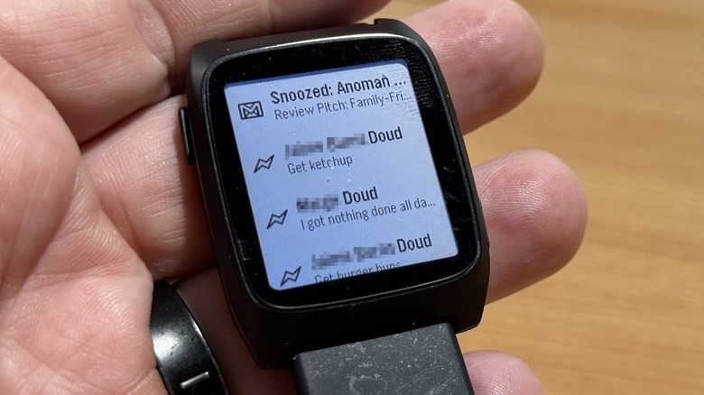 Man holding the Pebble Time 2