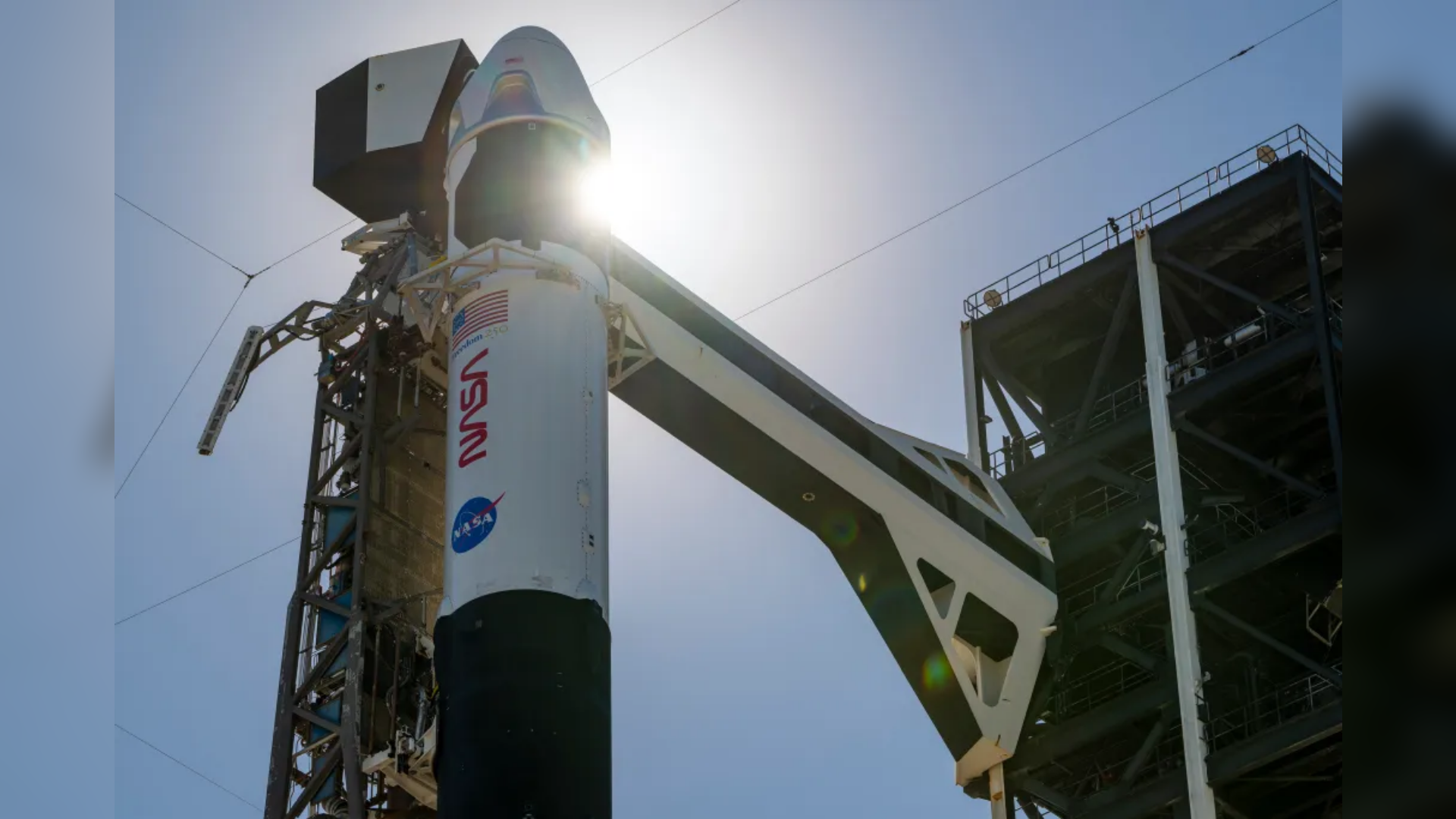 NASA's SpaceX Crew-13 rocket and spacecraft sit on the launch pad.
