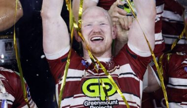 Liam Farrell celebrates with the Super League Grand Final trophy in 2024