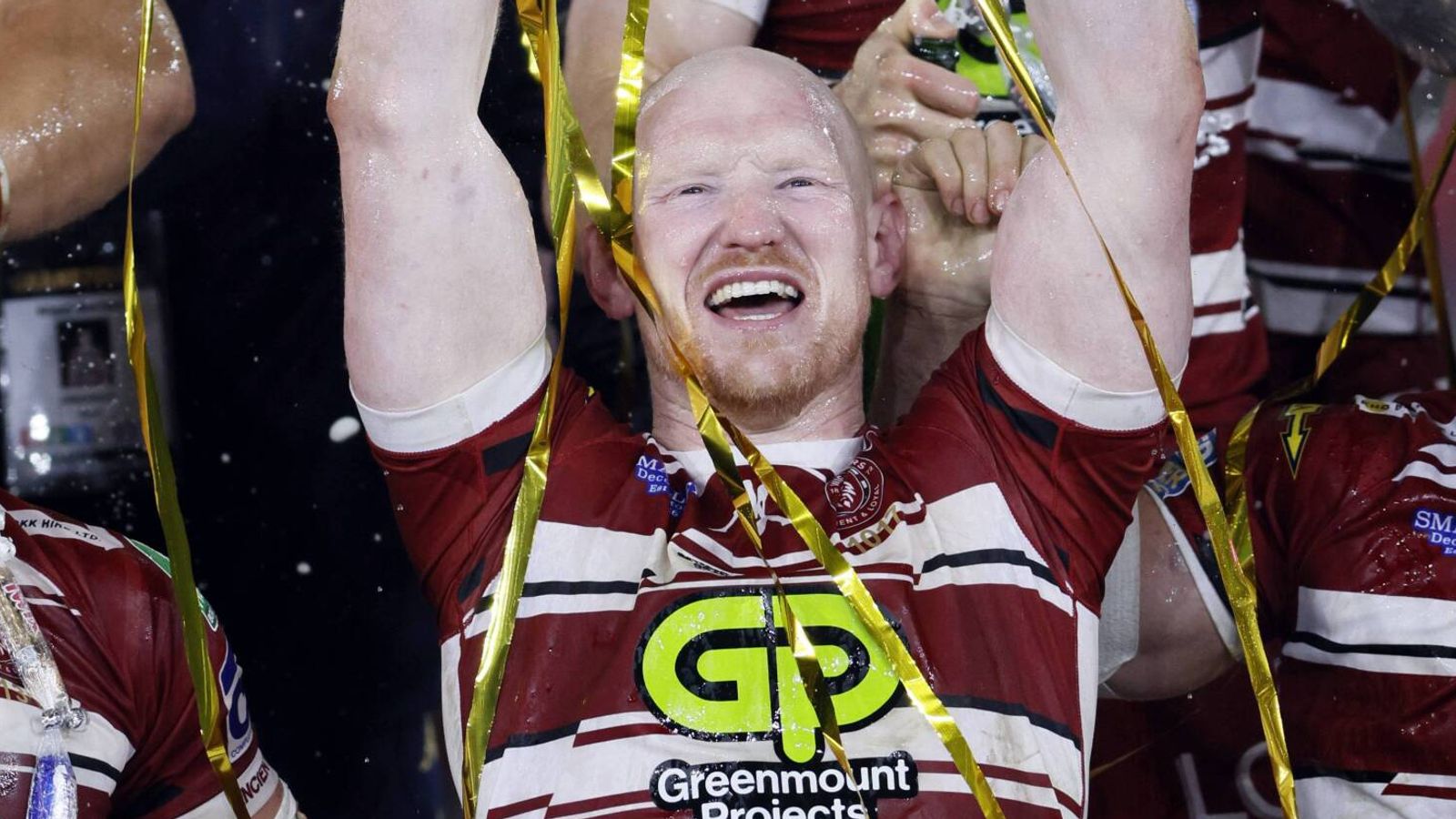 Liam Farrell celebrates with the Super League Grand Final trophy in 2024