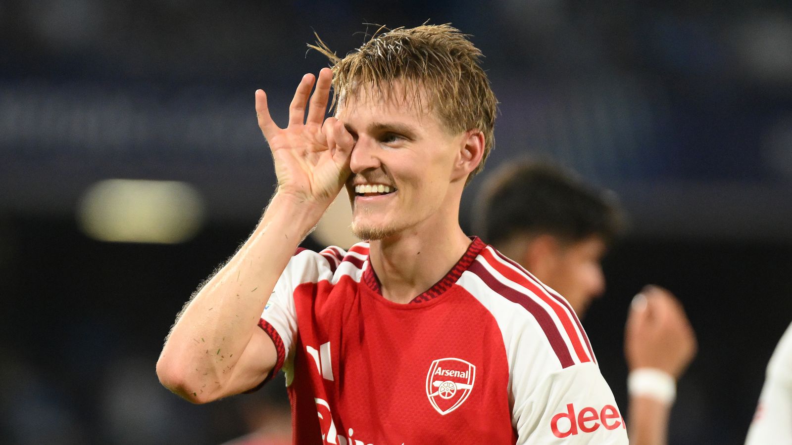 Martin Odegaard celebrates scoring against Napoli