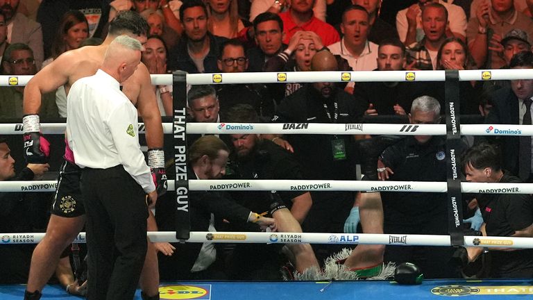 OUCH! Carty lands on his head and shoulder outside the ring