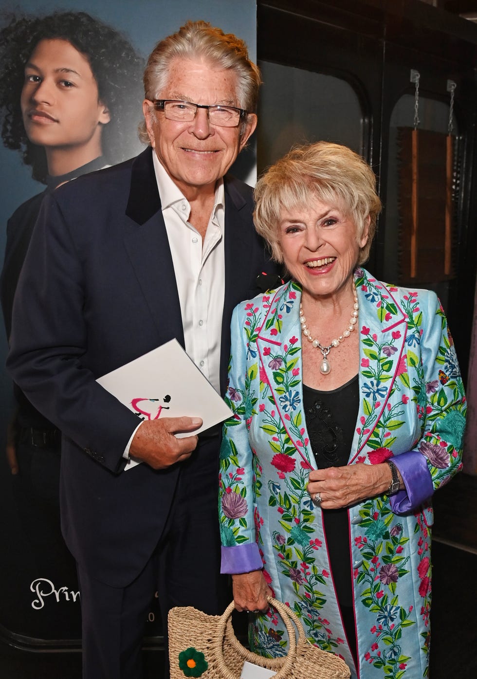 Stephen Way and Gloria Hunniford stephen way and gloria hunniford attend the press night performance of cinderella at the gillian lynne theatre, him in a blue suit with white shirt, and her in a light blue floral jacket over a black dress