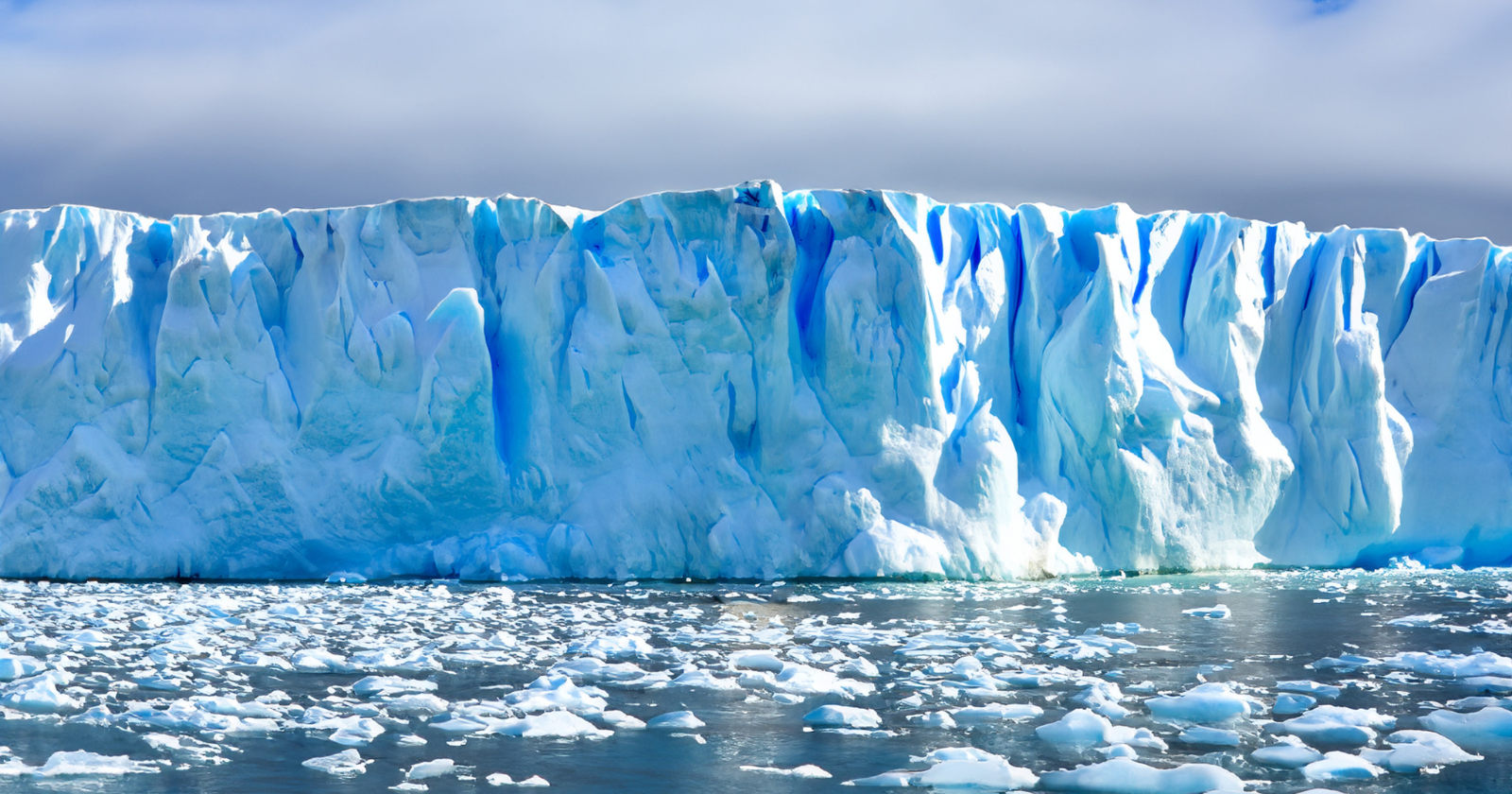 Antarctica holds a continuous record of the air going back 800,000 years, locked in bubbles inside a two-mile column of ice that scientists drilled out one section at a time, so that every atmosphere for eight hundred millennia now sits catalogued on shelves in European laboratories, ancient air trapped in frozen bubbles