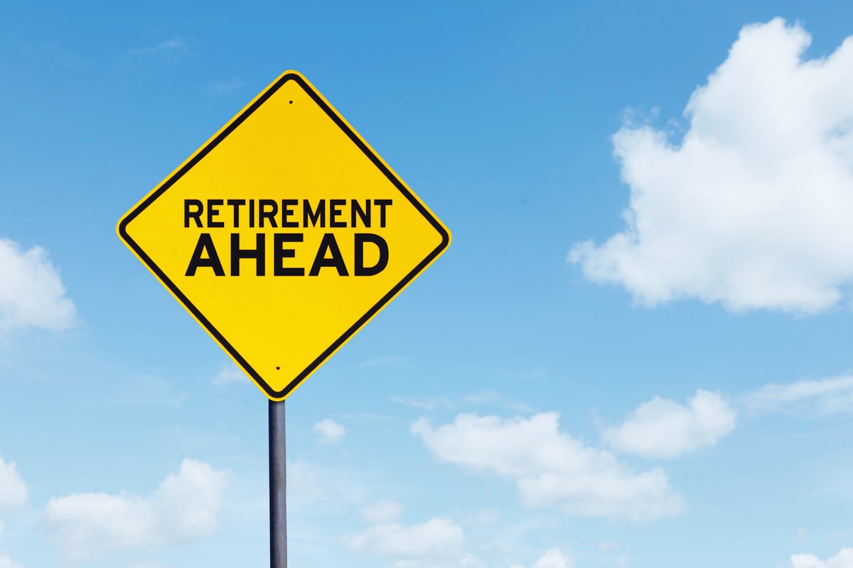 A road sign says "retirement ahead."