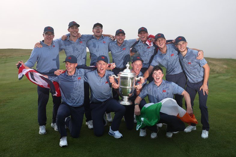 Great Britain & Ireland show off the Walker Cup trophy after their stunning victory at Lahinch.