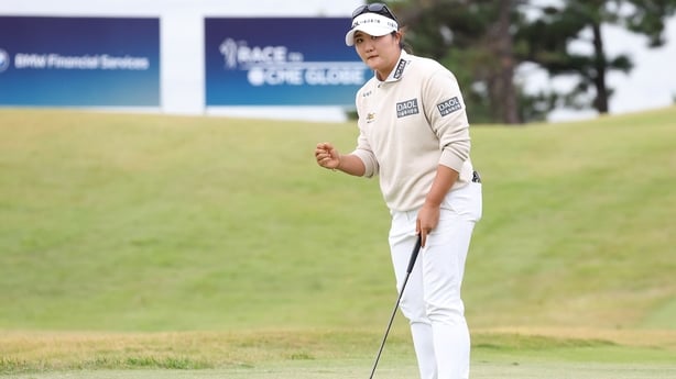 Haeran Ryu of South Korea reacts after sinking a putt for birdie to finish play on the 18th green during the second round of the BMW Ladies Championship 2026