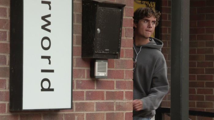 03_11_coro_brody Brody sneaks around outside of the factory in a scene from Coronation Street