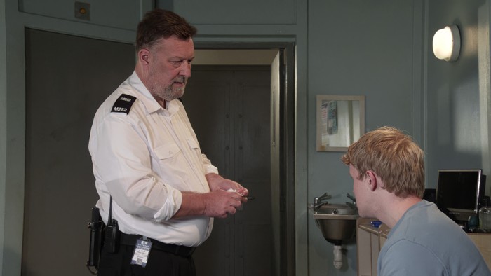 04_11_coro_ross_marco_03 Ross stands over Marco in a scene from Coronation Street