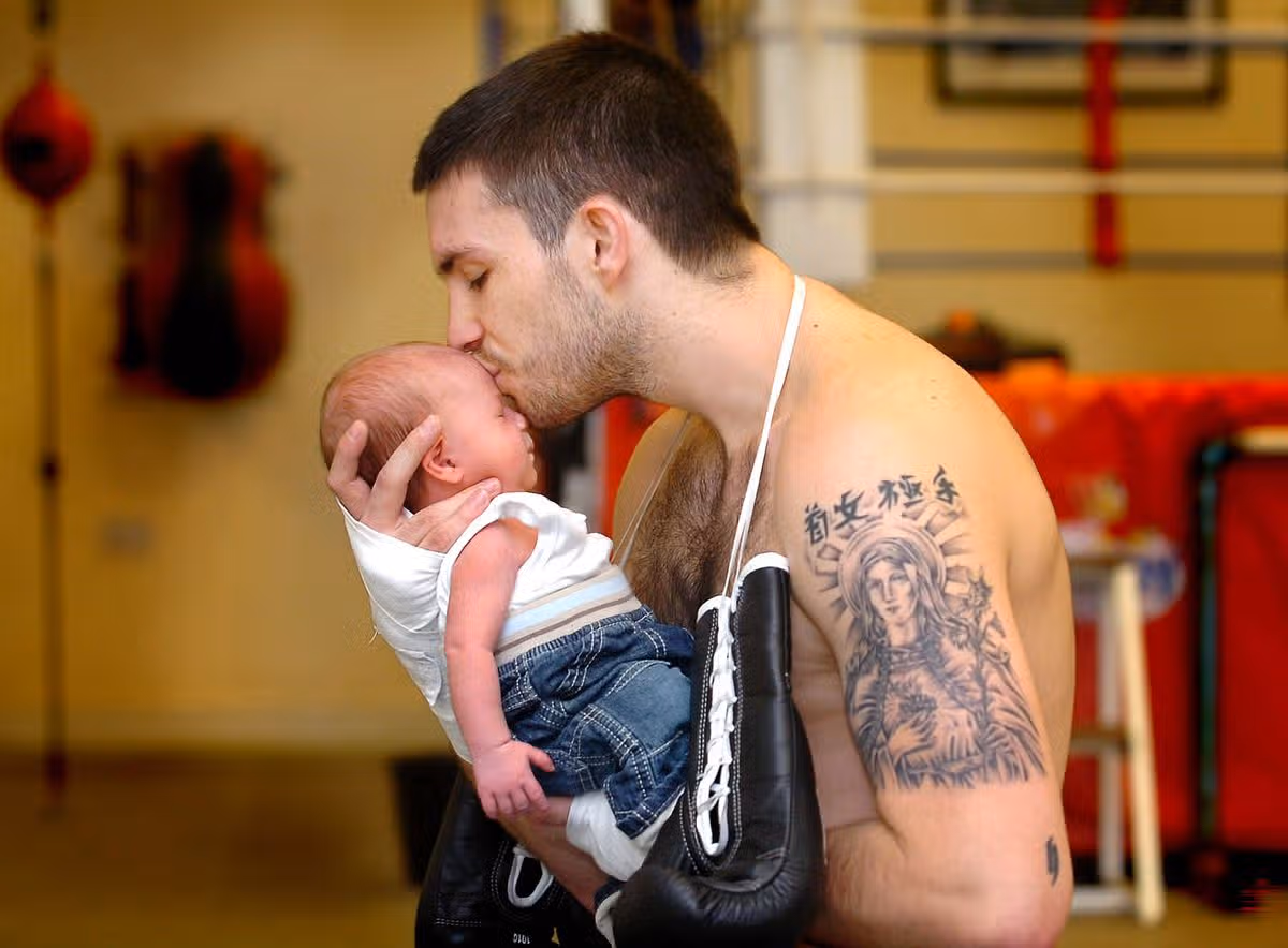 Boxer Paul Smith with son Paul Jnr just after he was born in 2006
