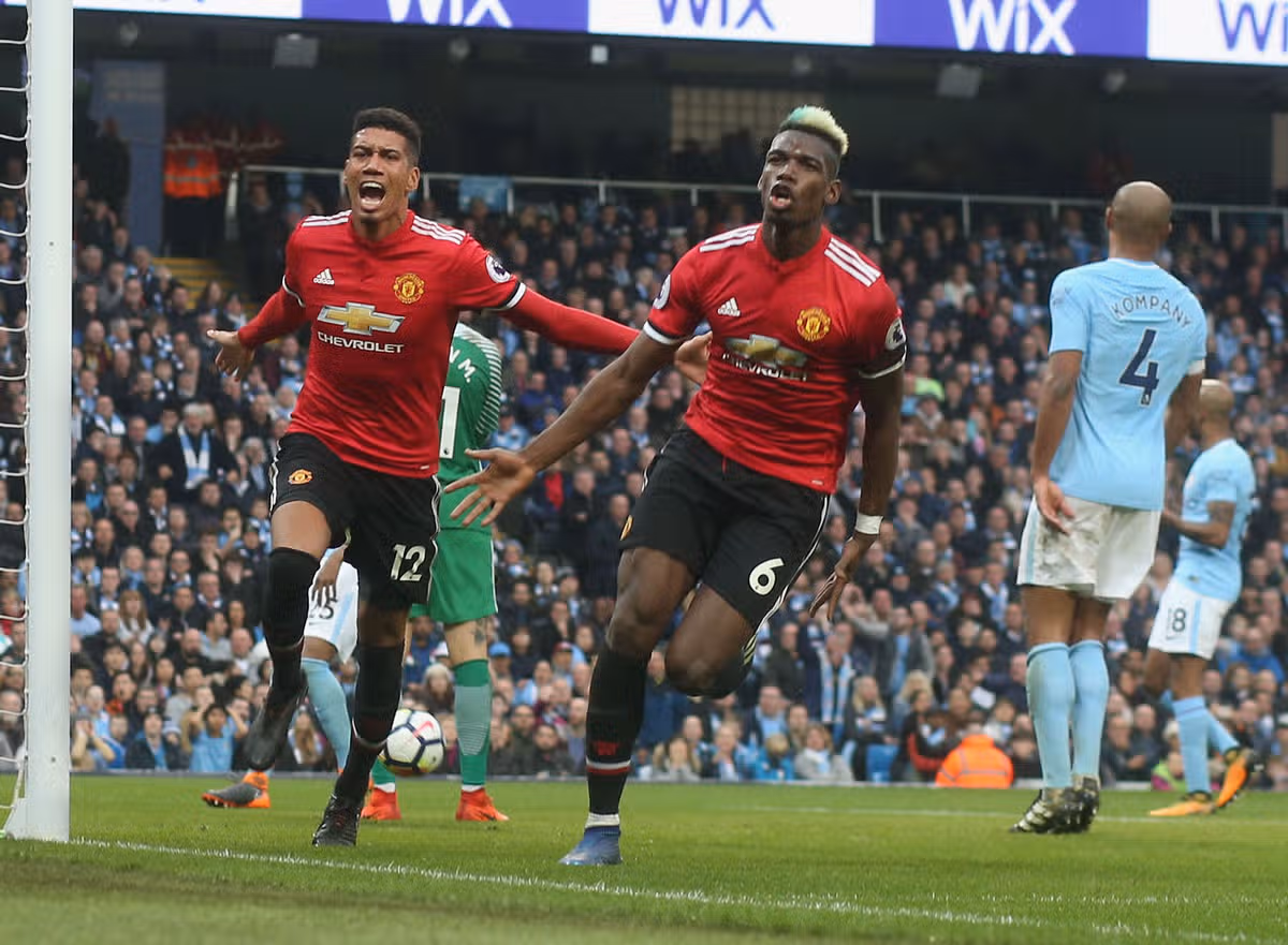 Chris Smalling (left) and Paul Pogba inspired a famous Manchester United comeback in 2018.