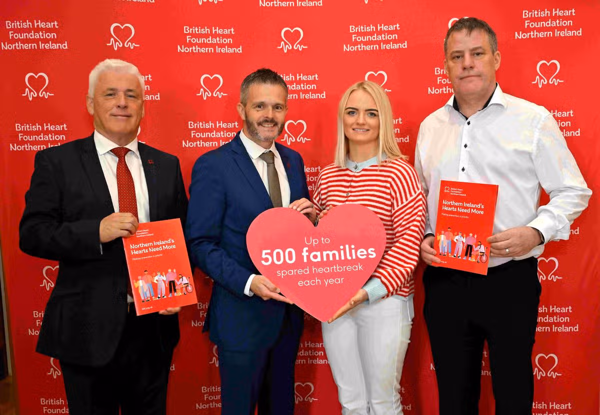 Health Minister Robbie Butler with Head of BHF NI Fearghal McKinney, Lucy Huffington from Portstewart, who lost her father Garry suddenly to a heart attack in September and Terry