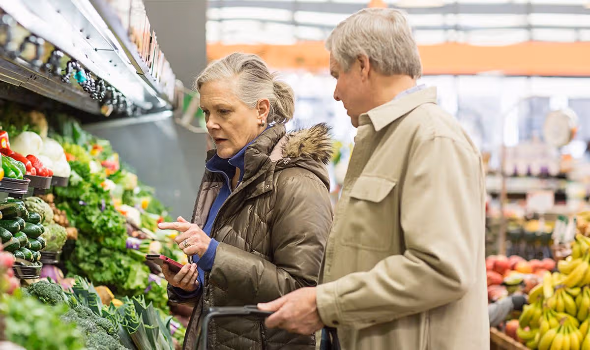 A pensioner couple shopping