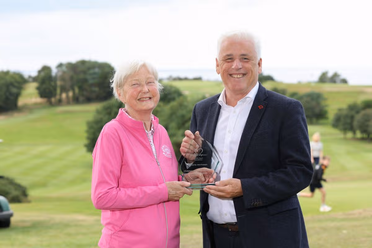 Valerie receiving the British Heart Foundation’s Outstanding Contribution Award for Northern Ireland from Head of BHF NI Fearghal McKinney, in recognition of her years of fundraising, volunteering and advocacy for people affected by cardiovascular disease.