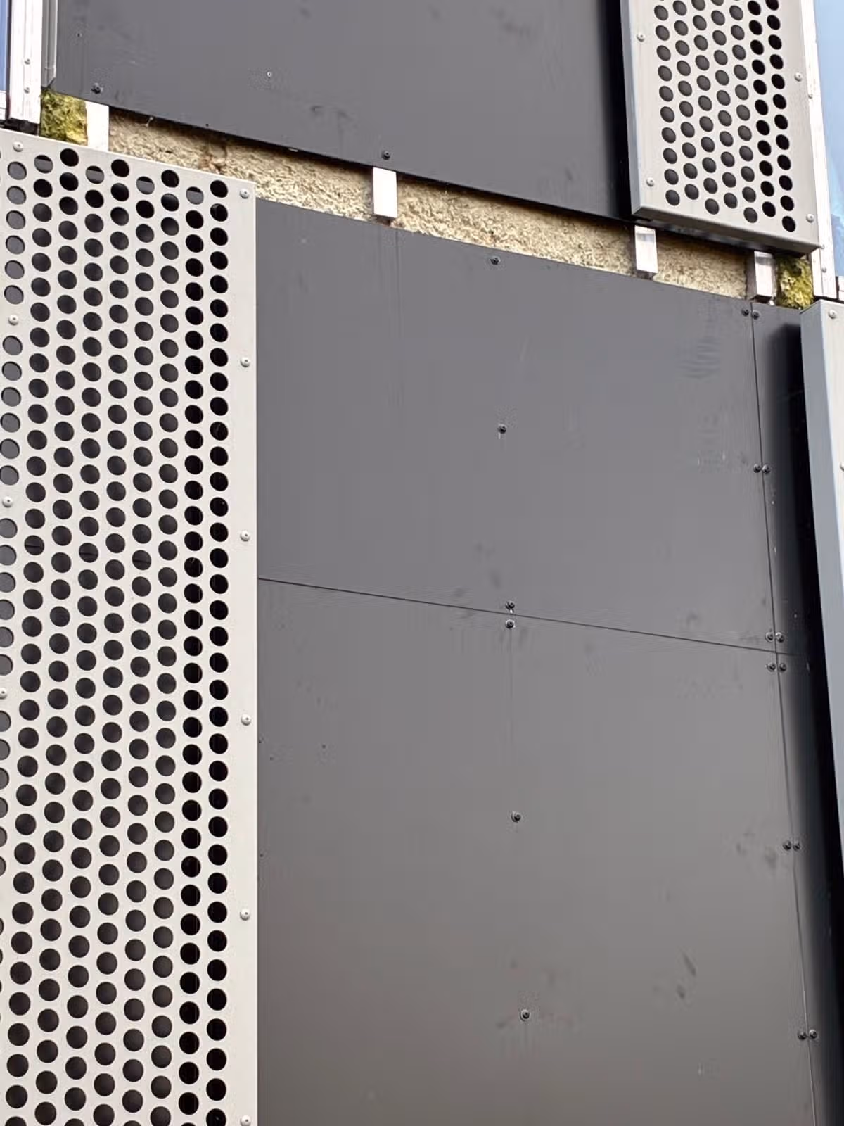 Insulation installed in the hospital appears to have turned green and black.