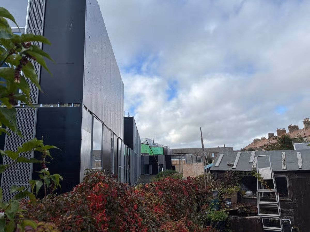 The hospital building comes extremely close to the rear garden wall of properties on Low Green