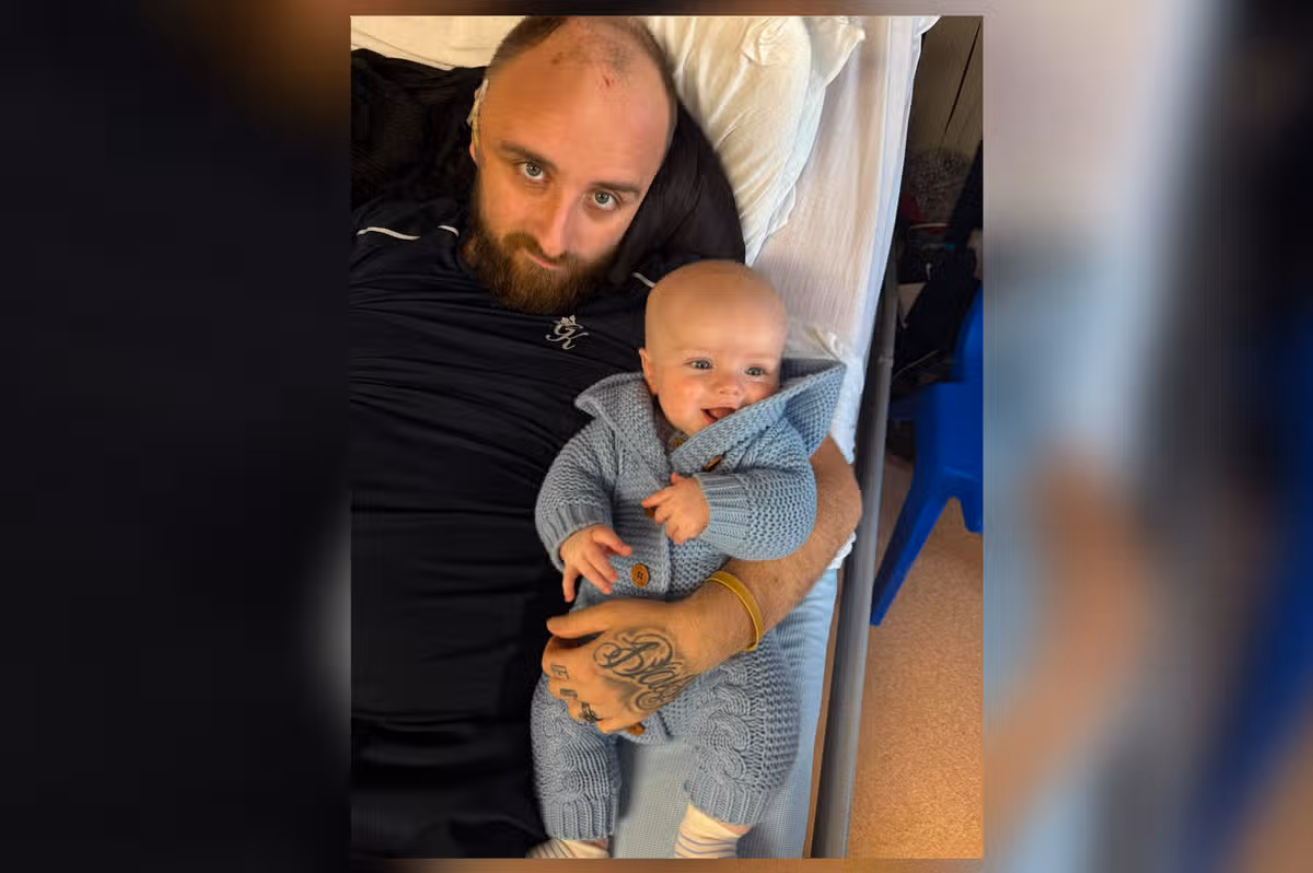 Jordan Ballantyne and his newborn back in 2024