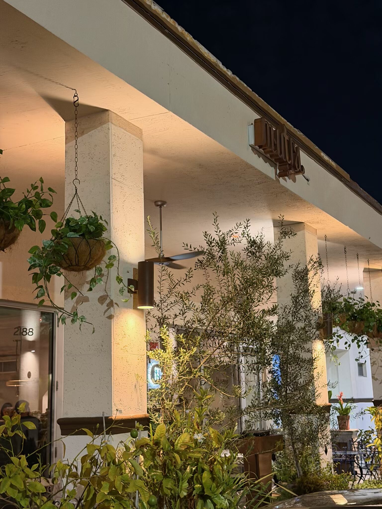 The exterior of Mutra in North Miami at night