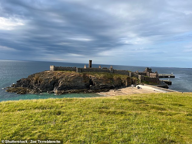 Holly Christian visited the Isle of Man to attempt to break the world record for the 'largest standing roll-down exercise class ever'