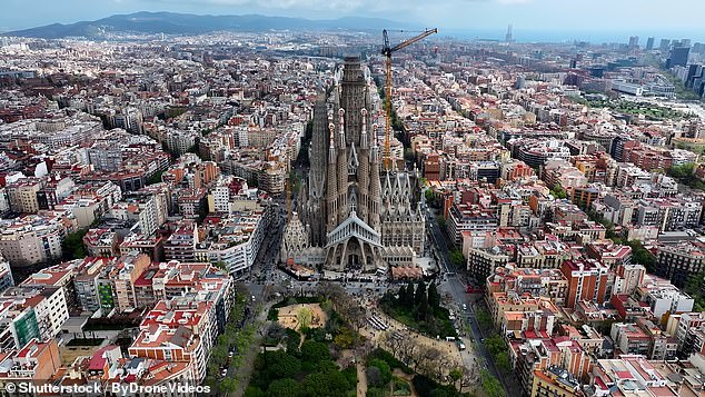 Travellers are dishing out the cities where they felt 'unwelcome' as tourists - from 'rude' locals to feeling 'hostility' in crowded areas (stock image of Barcelona)