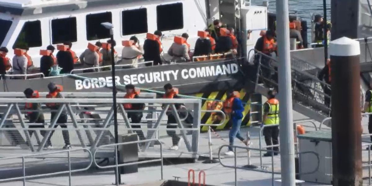 Migrant dinghy carrying dozens of asylum seekers heading for Hampshire after launching from Normandy beach