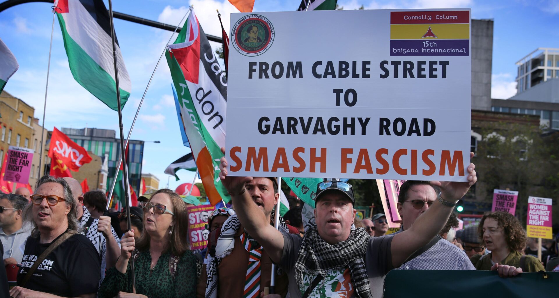 An Irish Republican supporter seen holding a sign saying