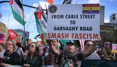 An Irish Republican supporter seen holding a sign saying
