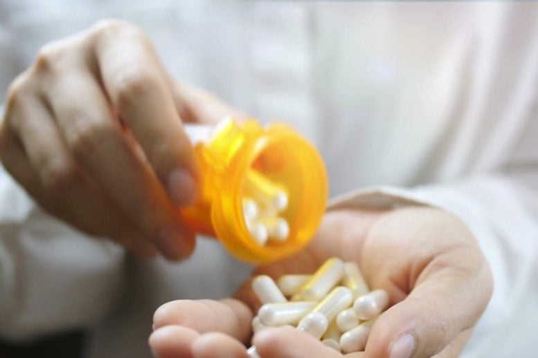 Pouring Pills From Prescription Medicine Bottle