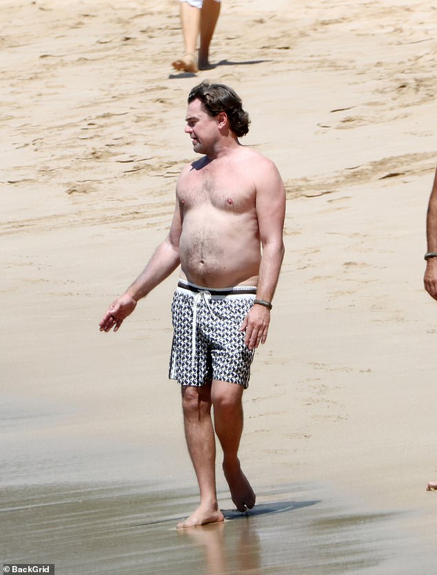 Leonardo DiCaprio has become Hollywood¿s poster boy for the ¿dad bod¿ and was recently pictured enjoying a beach day with his glamorous girlfriend, 28-year-old model Vittoria Ceretti