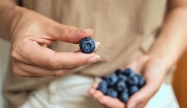 Woman Holding Organic Blueberry