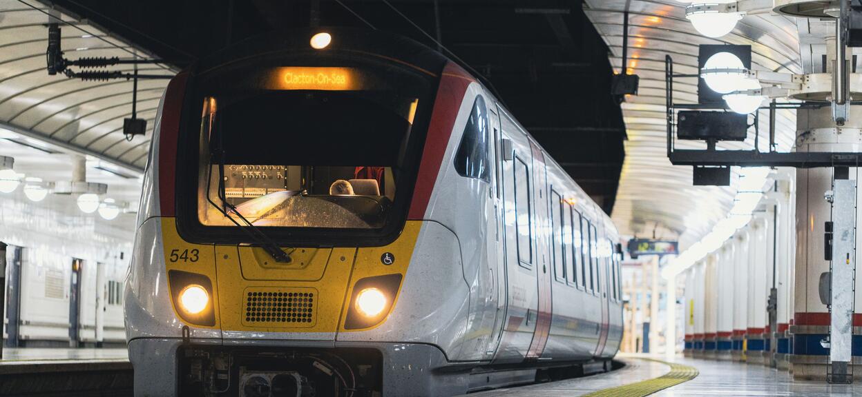 A Class 720 Aventra train departing a station