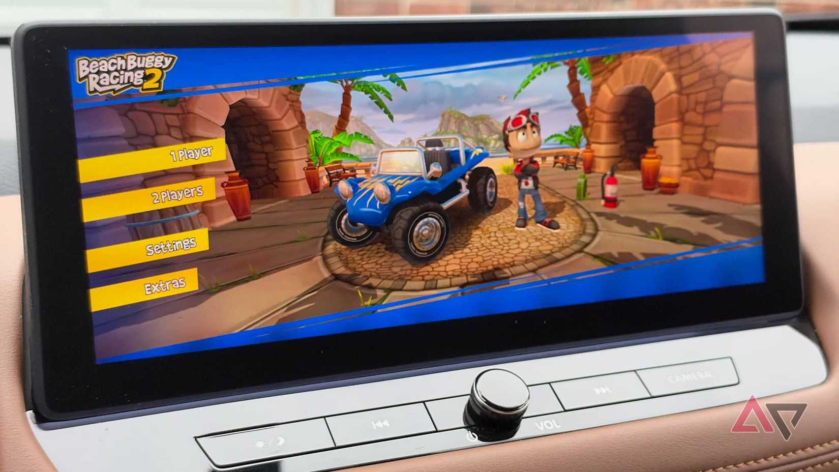 A car dashboard infotainment screen showing Beach Buggy Racing 2.