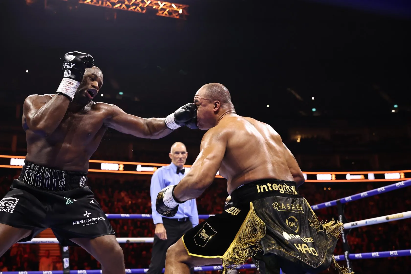 Fabio Wardley takes a left hand from the rampaging Daniel Dubois during their October 2026 rematch