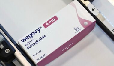 A box containing Wegovy tablets moves along a line at Novo Nordisk