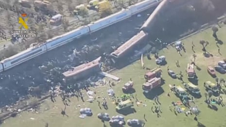 Aerial footage shows aftermath of deadly Spain train collision – video