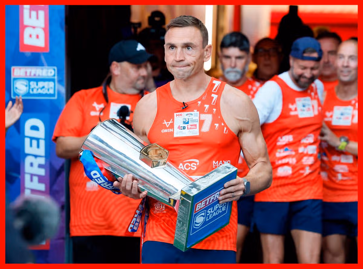 Sir Kevin Sinfield brings out the trophy ahead the Betfred Super League Grand Final at Old Trafford, Manchester