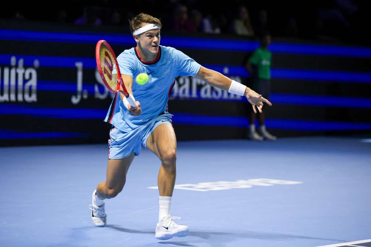 Rune wins first match on ATP Tour against big serving Frenchman after lengthy injury spell