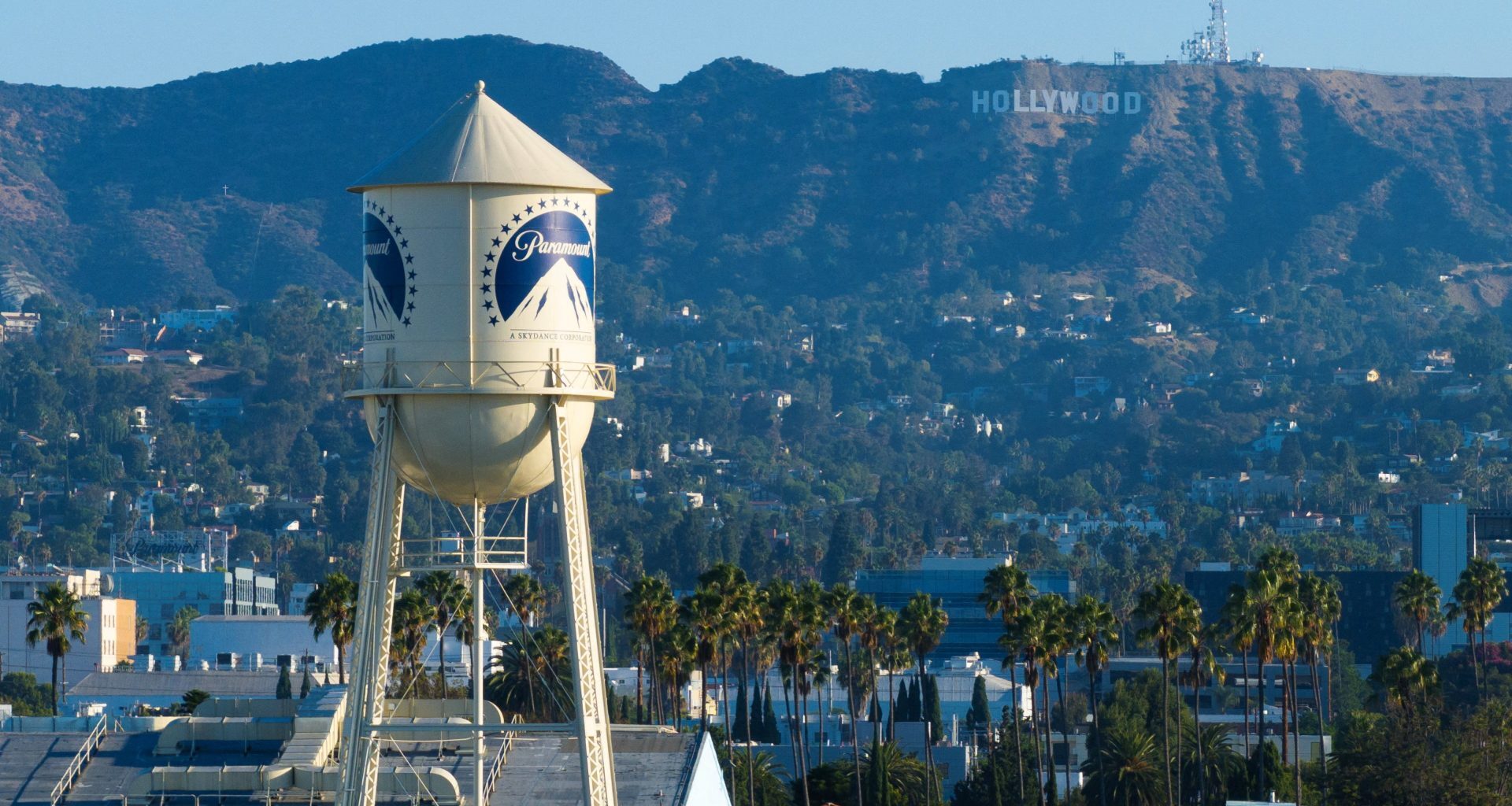 A drone view shows the Paramount water tower at Paramount studios in Hollywood and the Hollywood sign, in Los Angeles, California, U.S., August 24, 2026.