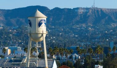 A drone view shows the Paramount water tower at Paramount studios in Hollywood and the Hollywood sign, in Los Angeles, California, U.S., August 24, 2026.